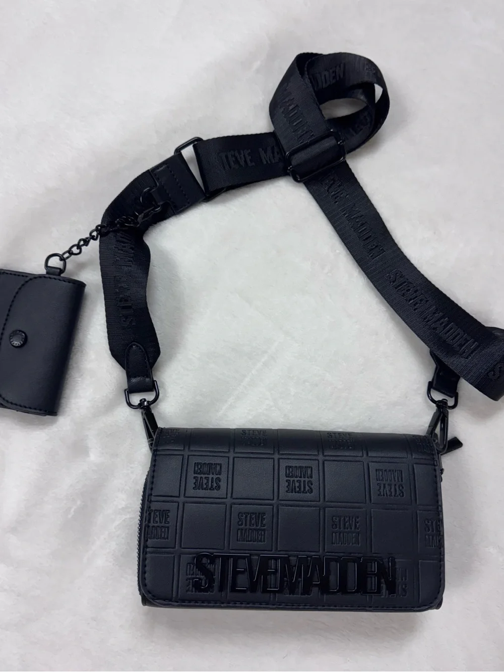 Steve Madden Black Embossed Logo Crossbody Bag.